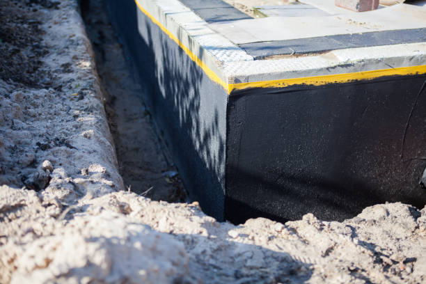 Professional Waterproofing technician working in Ragland, AL